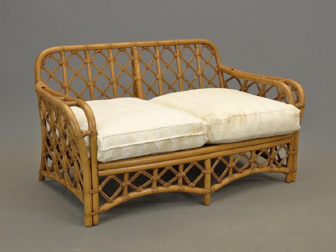Bamboo Settee: Bamboo settee cushions. Labeled "Fick's Reed". 57" x 30" x 29" Ht..