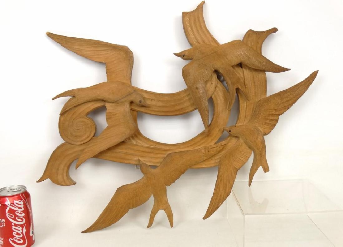 Bird Carving: Folk art bird carving. Mounts on wall. 23" x 19". Signed and dated "Mo Abbot '63". Small chips to corners.