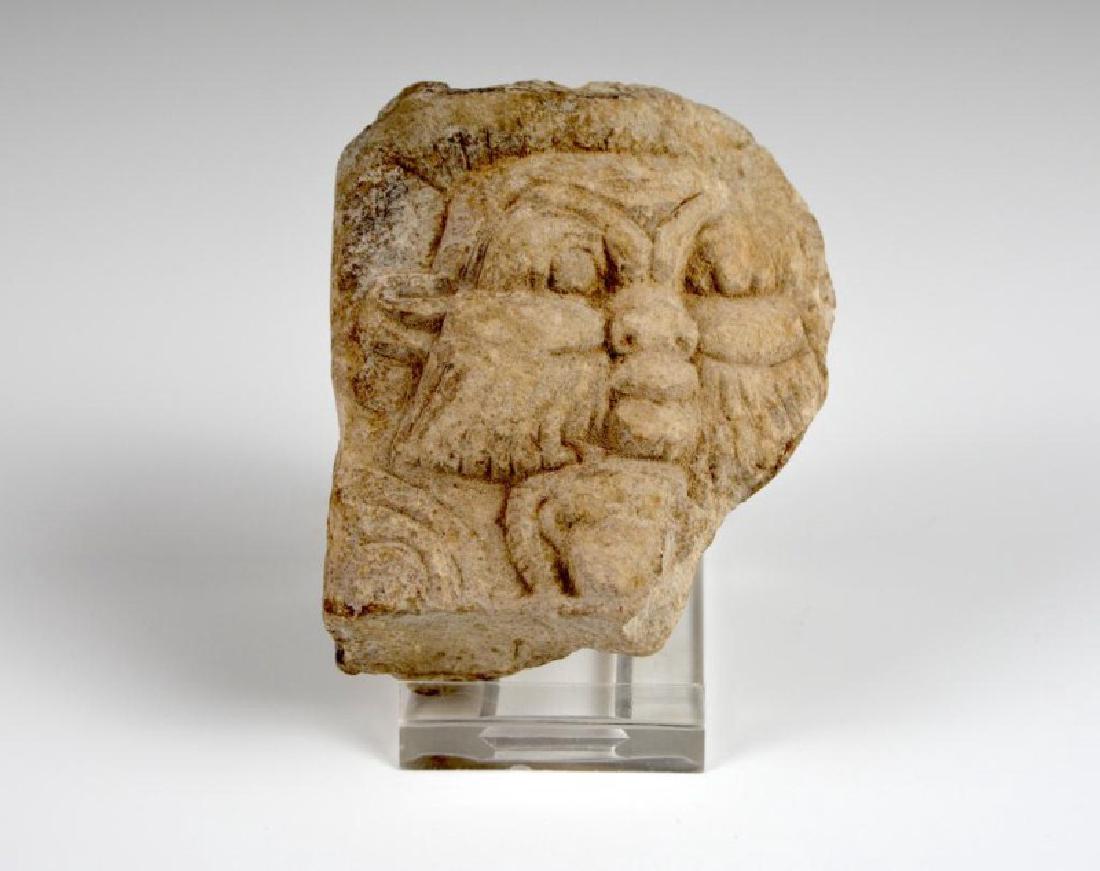 AN EGYPTIAN STONE CARVING OF A GOD (1 of 3)