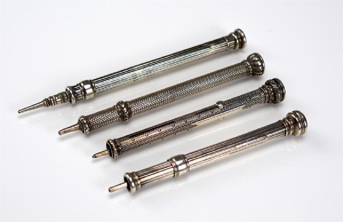 THREE SAMPSON MORDAN TELESCOPING PENCILS: A lot of Three Sampson Mordan telescoping pencils, all marked, together with another by J. Butler and Co. Two topped with blood stones and another with an initialed stone.