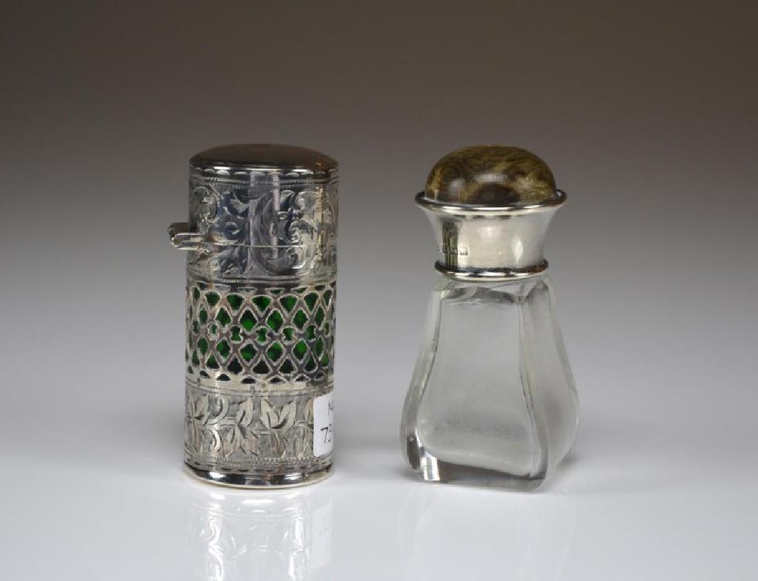TWO ENGLISH SILVER MOUNTED SCENT BOTTLES (1 of 2)