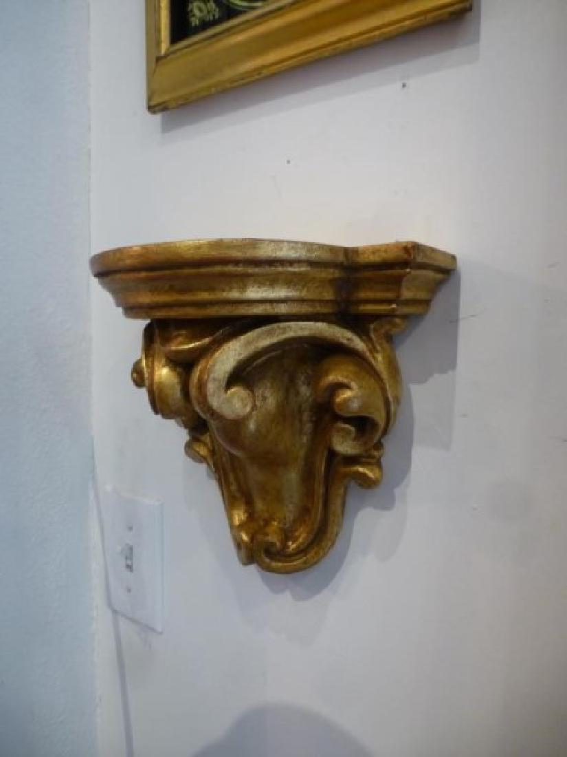 Pair of carved giltwood wall brackets: probably Italian