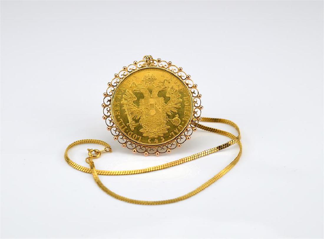 Hungarian gold sovereign mounted in a gold frame (1 of 2)