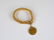 18k yellow gold link bracelet with Hungarian coin