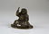 Patinated bronze figure