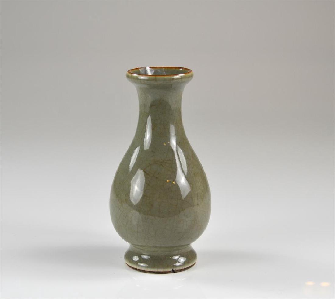 Chinese celadon glazed pottery vase (1 of 2)