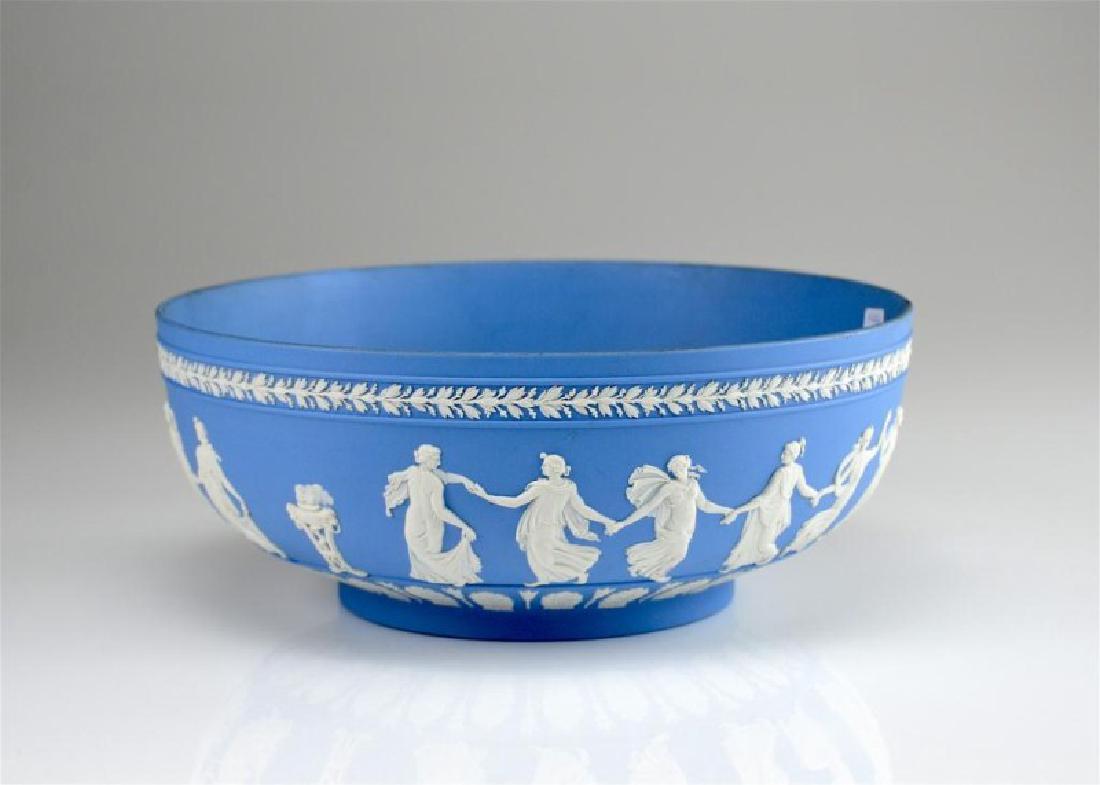 Wedgwood blue Jasperware Dancing Hours center bowl: Decorated with dancing females and a grapevine border. Dia 26 cm. (10 1/4 in.)