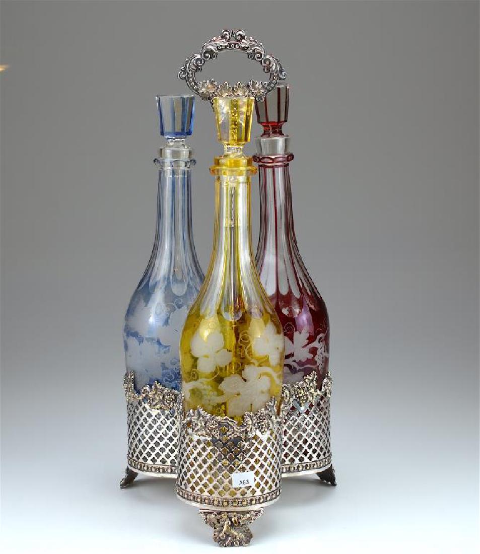 Silverplated tantalus fitted with decanters (1 of 5)