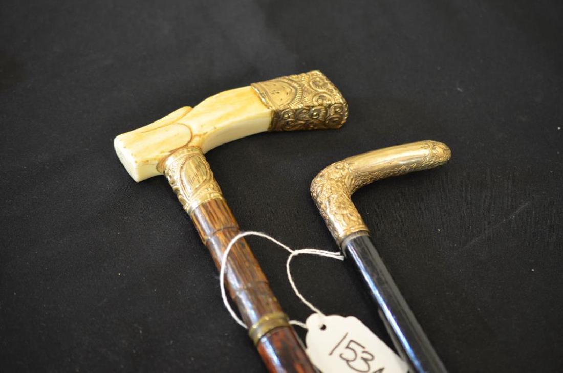 Two antique gold filled handled walking sticks (1 of 1)