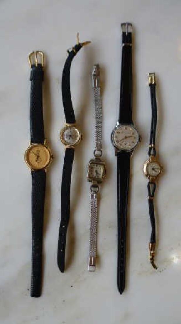 Two gold ladies wrist watches with three other (1 of 2)
