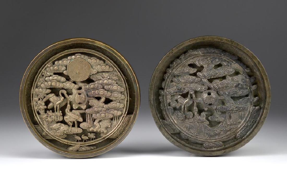TWO JAPANESE BRONZE AND TIN HAND MIRRORS (1 of 2)