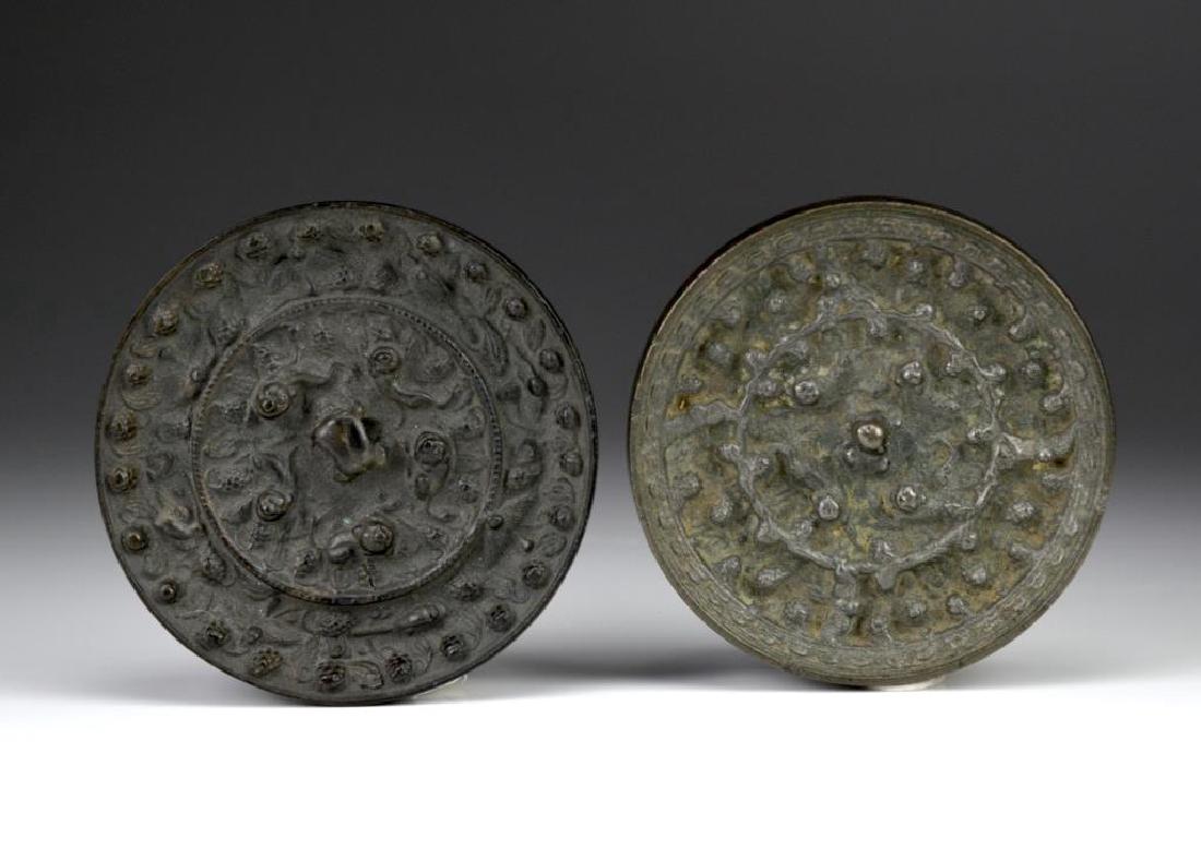 TWO CHINESE TANG DYNASTY STYLE BRONZE HAND MIRRORS (1 of 2)