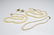 Three pearl necklaces & gold and pearl earrings