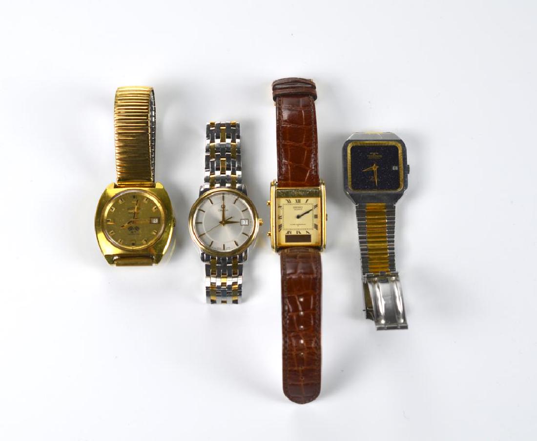 Four men's wristwatches: Including Omega, Seiko, Rotary, and Technos.