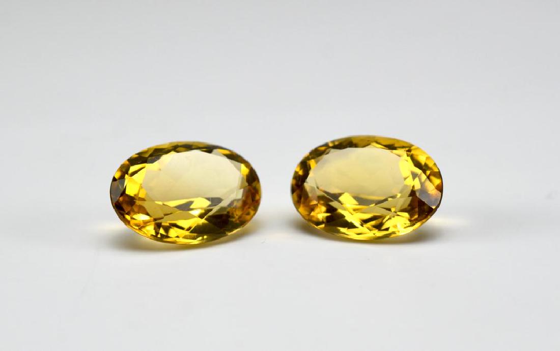 Two loose oval citrine gemstones (1 of 1)