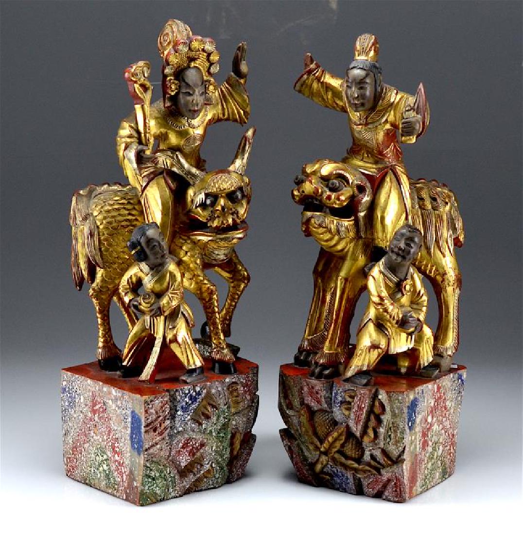 Pair of Chinese carved giltwood figural groups (1 of 1)