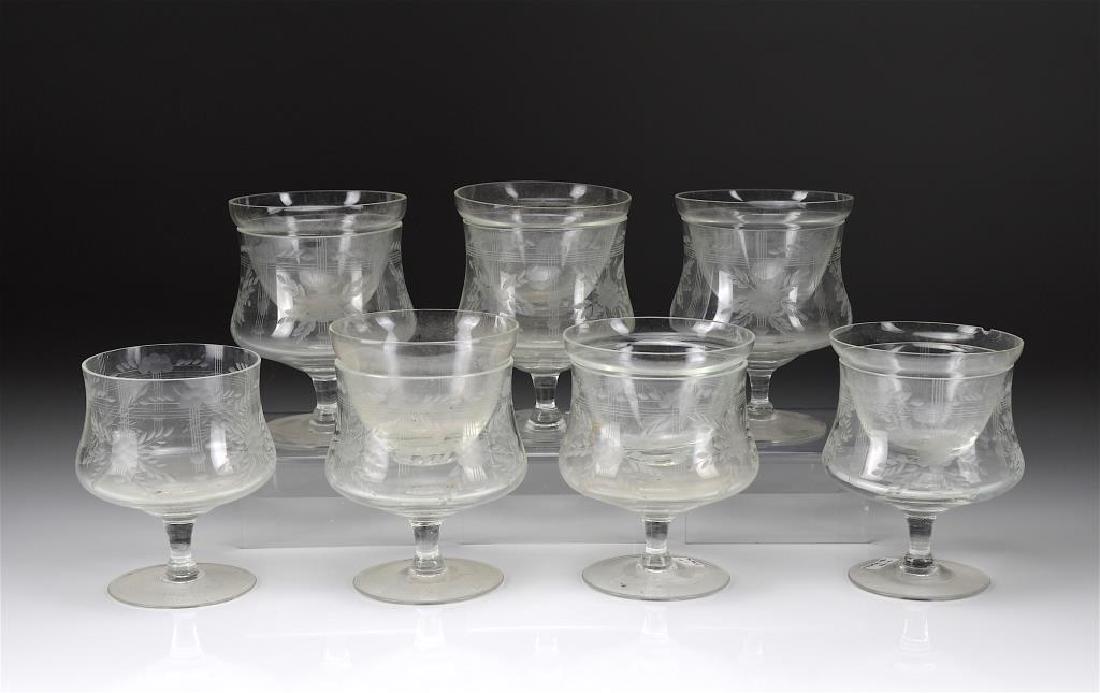 Six etched glass shrimp cocktail glasses w/ liners: With floral and foliate decoration.