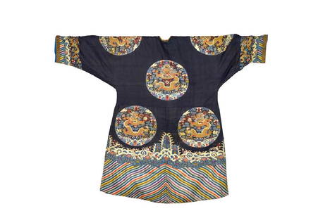 CHINESE KESI BLUE GROUND SILK DRAGON SUMMER ROBE: Woven with roundels of dragon, bats, clouds, waves, and flowers to upper body. Hem and edges of the sleeves decorated with terrestrial diagrams rising from turbulent waves churning auspicious and