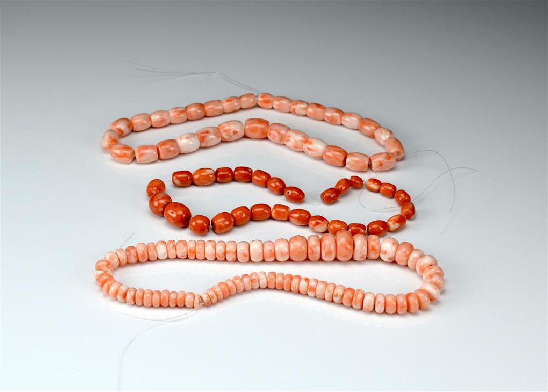 THREE CORAL BEAD STRANDS (1 of 5)