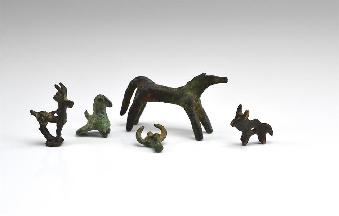 FIVE LURISTAN BRONZE ANIMAL PENDANTS (1 of 1)