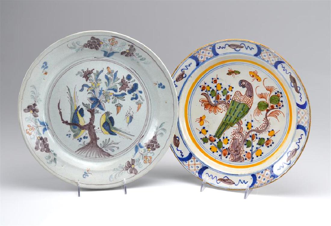 TWO DUTCH DELFT POTTERY FIGURAL CHARGERS (1 of 2)