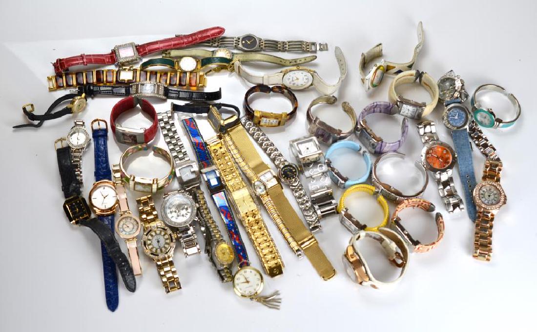Large lot of lady's wristwatches: Including Timex, Elgin, Geneva, Fossil, etc.