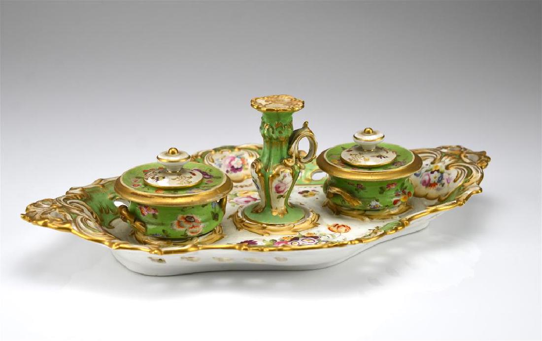 19th C English porcelain inkstand: Green ground with gilt and hand painted floral sprays. One inkpot stamped Derby. L. 34 cm (13 1/2 in.)