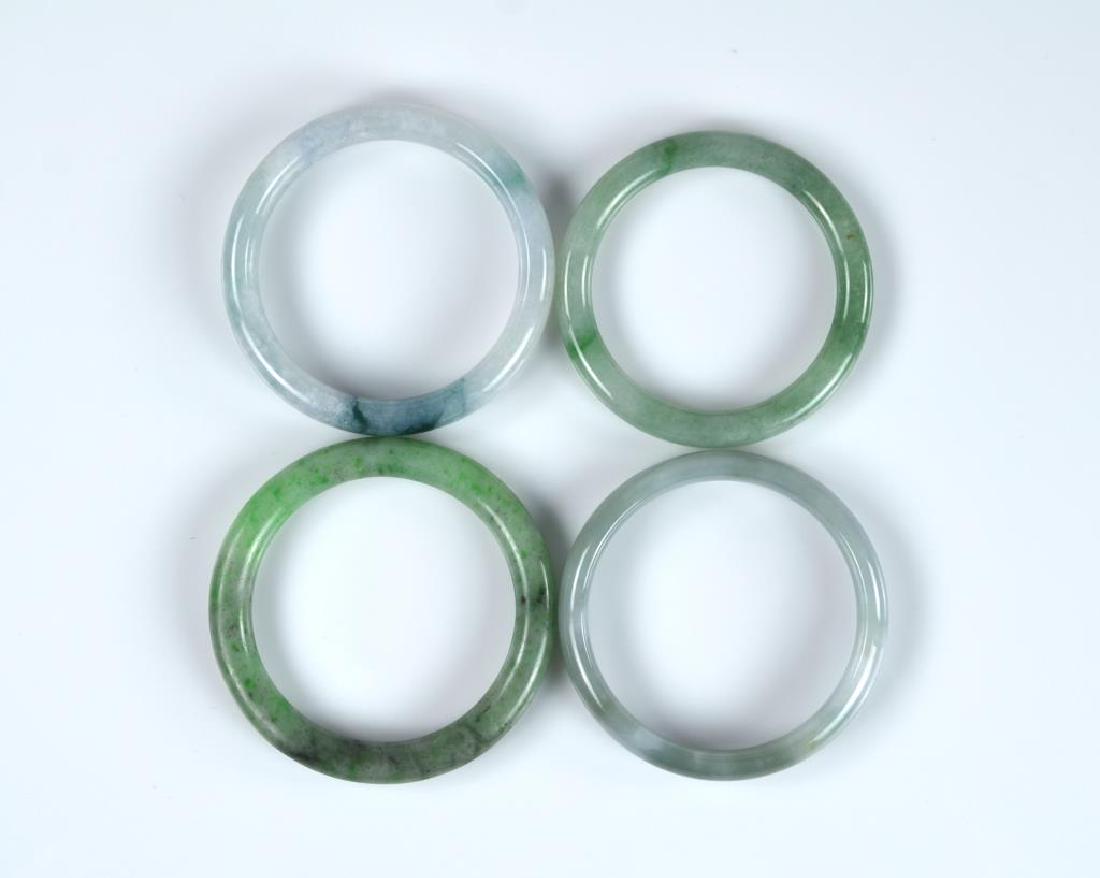 FOUR JADE CARVED BANGLES (1 of 4)