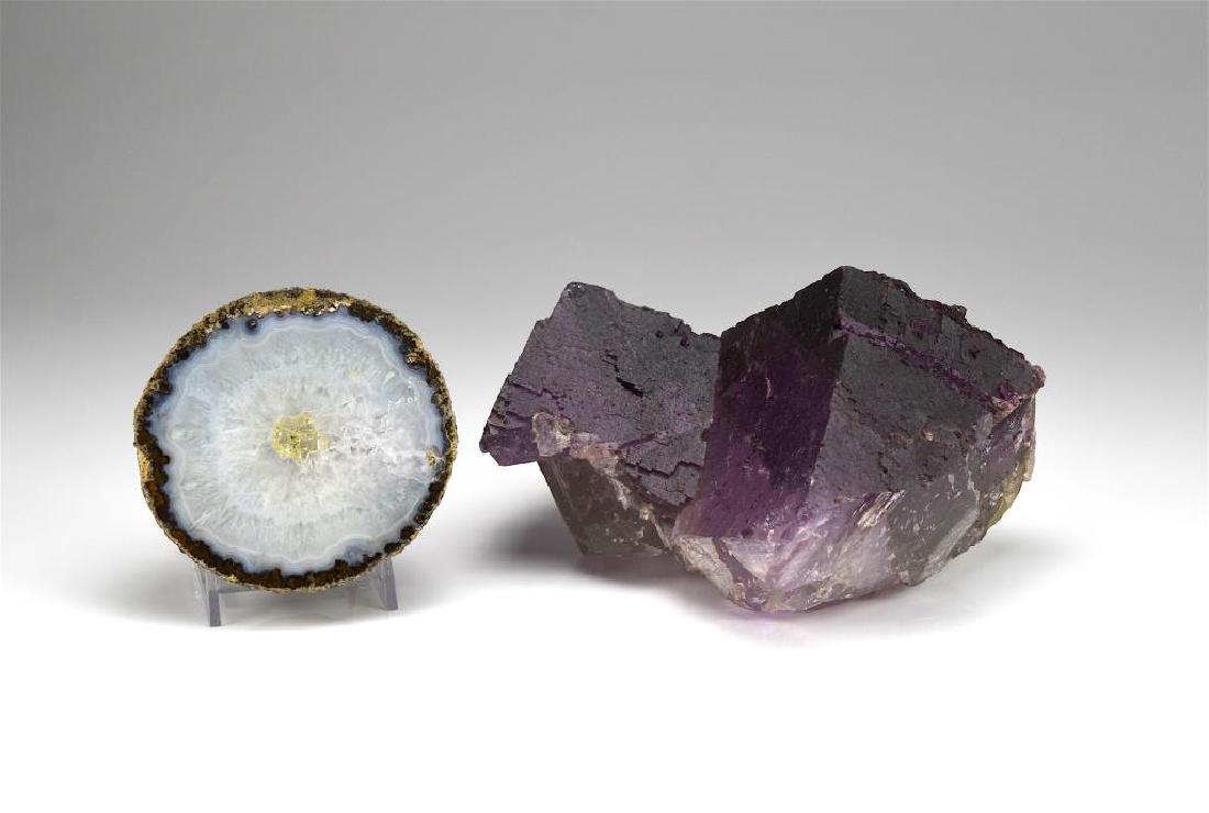 Fluorite mineral rock and a geode: L. of fluorite crystal: 21.5 cm (8 1/2 in.)