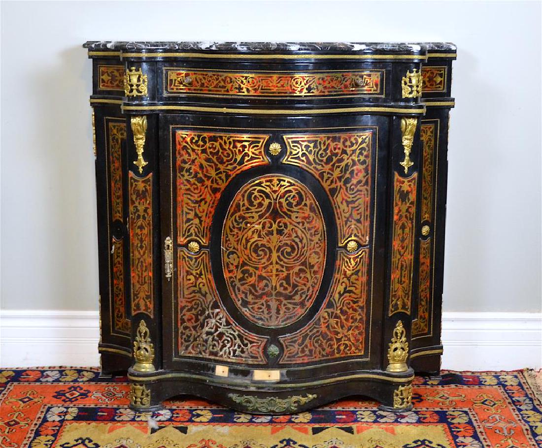 Boulle cabinet: Marble top with ormolu mounts. H: 38 1/4 in. W: 41 in. D: 16 1/2 in.