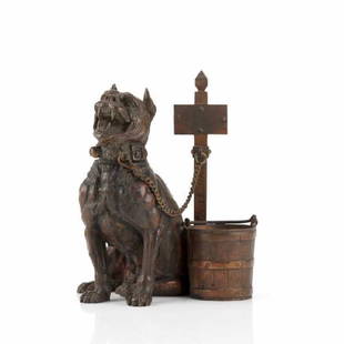 AUSTRIAN FIGURAL BRONZE INKWELL: Of a mastiff dog seated next to a pole and a bucket, the head opens to reveal an inkpot. Signed A. Leonard (Agathon Leonard). Early 20th C. H. 16 cm (6 3/8 in.)