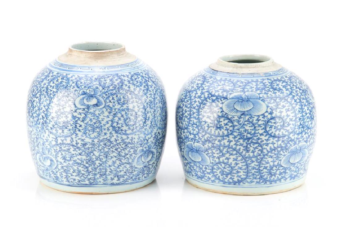 PAIR OF CHINESE EXPORT BLUE & WHITE GINGER JARS: Painted with floral and vine scrolls. Key fret border to neck. 19th C. H. 24cm (9 1/2 in.)