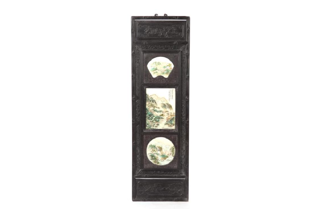 CHINESE WOOD FRAMED PORCELAIN PLAQUES WALL PANEL: Wood frame with shallow relief carvings of antique motifs. Three painted porcelain panels, one signed Wang Yeting. Size: 126 x 39cm (49 1/2 x 15 in.)