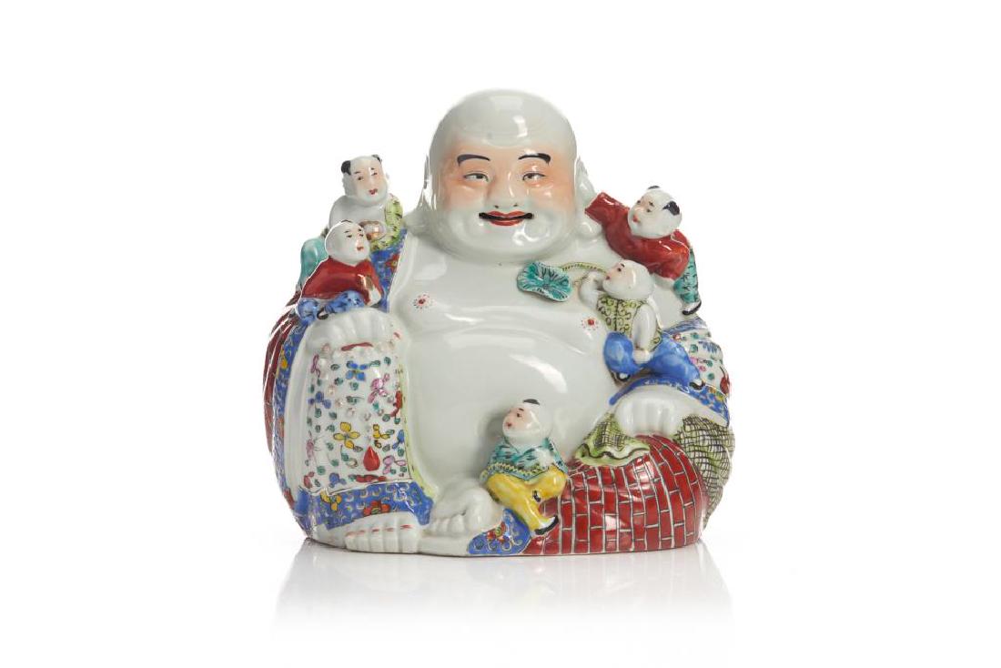 CHINESE FAMILLE ROSE PORCELAIN BUDDHA WITH KIDS: The laughing Buddha seated with five children climbing onto his body, decorated in coloured enamel. Mao Ji Sheng stamped mark to base, Republican period. H. 25cm (9 3/4 in.)
