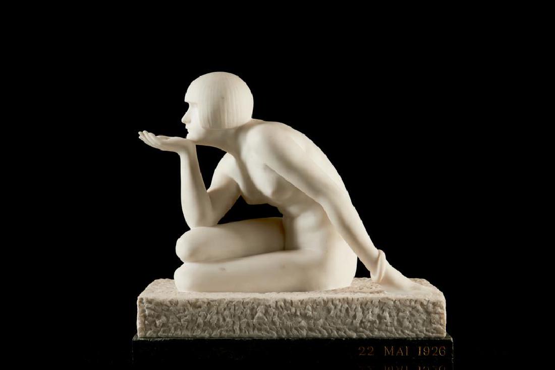 MAURICE GUIRAUD-RIVIERE (1881-1947): Enigma. Signed M. Guiraud-Riviere to white marble. A French Art Deco white marble figural sculpture of a seated nude female resting her chin on anoutstretched palm, atop a green marble base inscribed