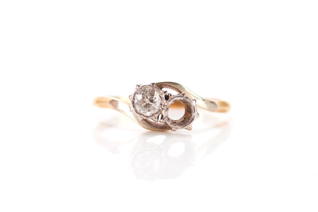 Antique gold & diamond ring: 18k yellow gold band set with two stones (one missing). 2g.