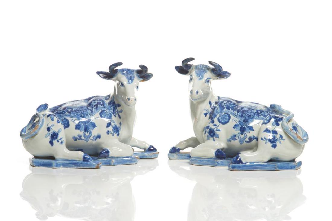 Pair of antique Delft pottery cow figures (1 of 4)