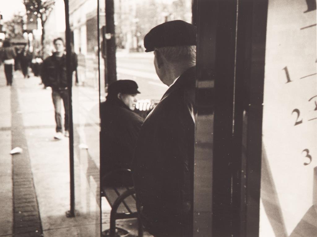 HUGH MARTIN (Canadian, b. 1973): Bus Shelter, Hamilton (1999)Gelatin Silver printSigned, titled versoSize: 5.5 x 7.5 in.Together with: Peter Sramek (Canadian, 20th C)Chios, GreeceGelatin silver print, artist's proofSigned and titled 