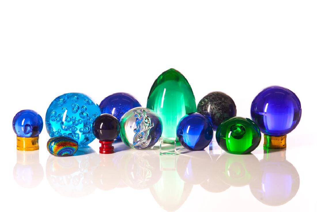 Assorted coloured glass paperweights and spheres Mar 26, 2019 A.H