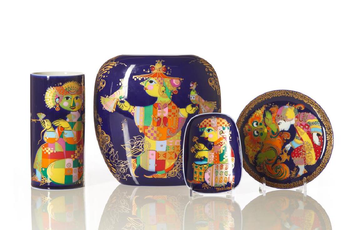 Four Bjorn Wiinblad porcelain pieces: Includes two Rosenthal Studio Linie vases, a small Aladdin und die Wunderlamp I plate, and a small 1001 Nacht dish, all with cobalt blue ground, decorated with female figures and gilt accents.Marks to