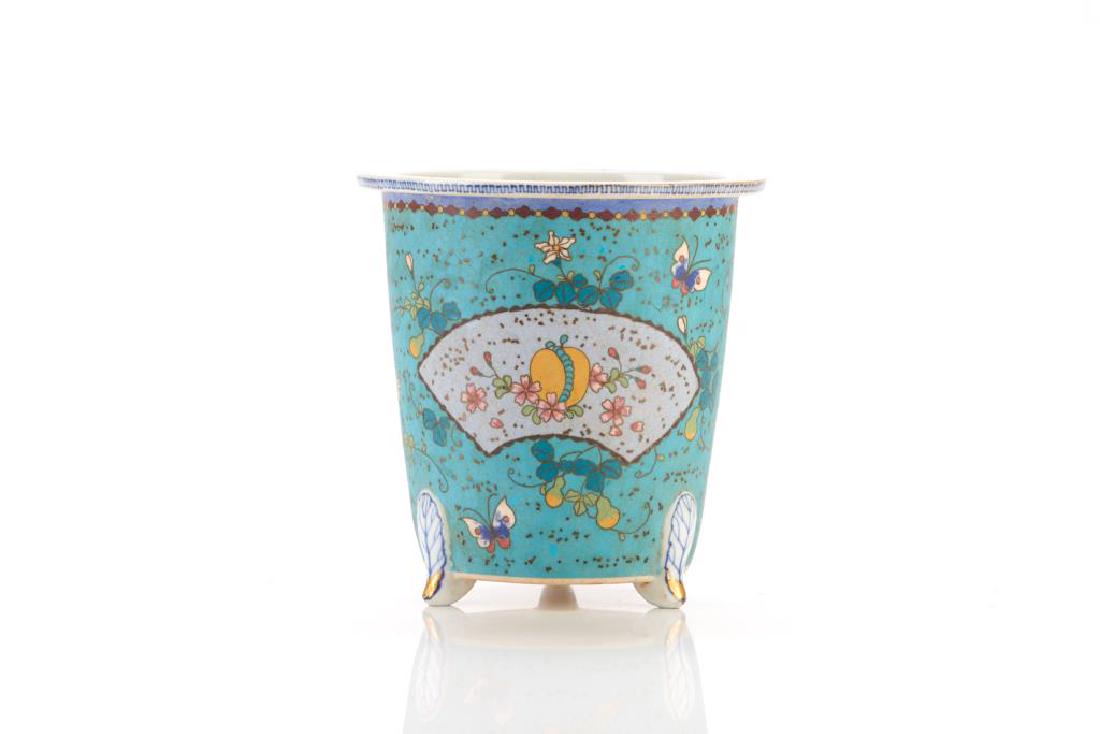 JAPANESE TOTAI CLOISONNE PORCELAIN PLANTER: Blue and white paintings to rim and foot. Body wired with turquoise ground featuring double gourd vines and fan shaped cartouches. Base marked Takeuchi Chubei in red. Meiji period, 19th C. H.16.5cm (6