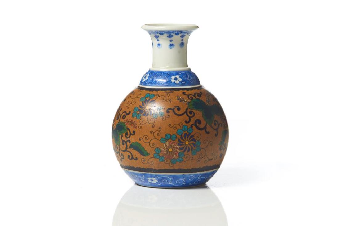 JAPANESE TOTAI CLOISONNE PORCELAIN BOTTLE VASE: Blue and white painted neck and foot, body enamelled with brown ground and floral vine patterns. Base signed Dai Nippon Kaiyosha in red. Meiji period, 19th C. H. 18.5cm (7 1/4 in.)