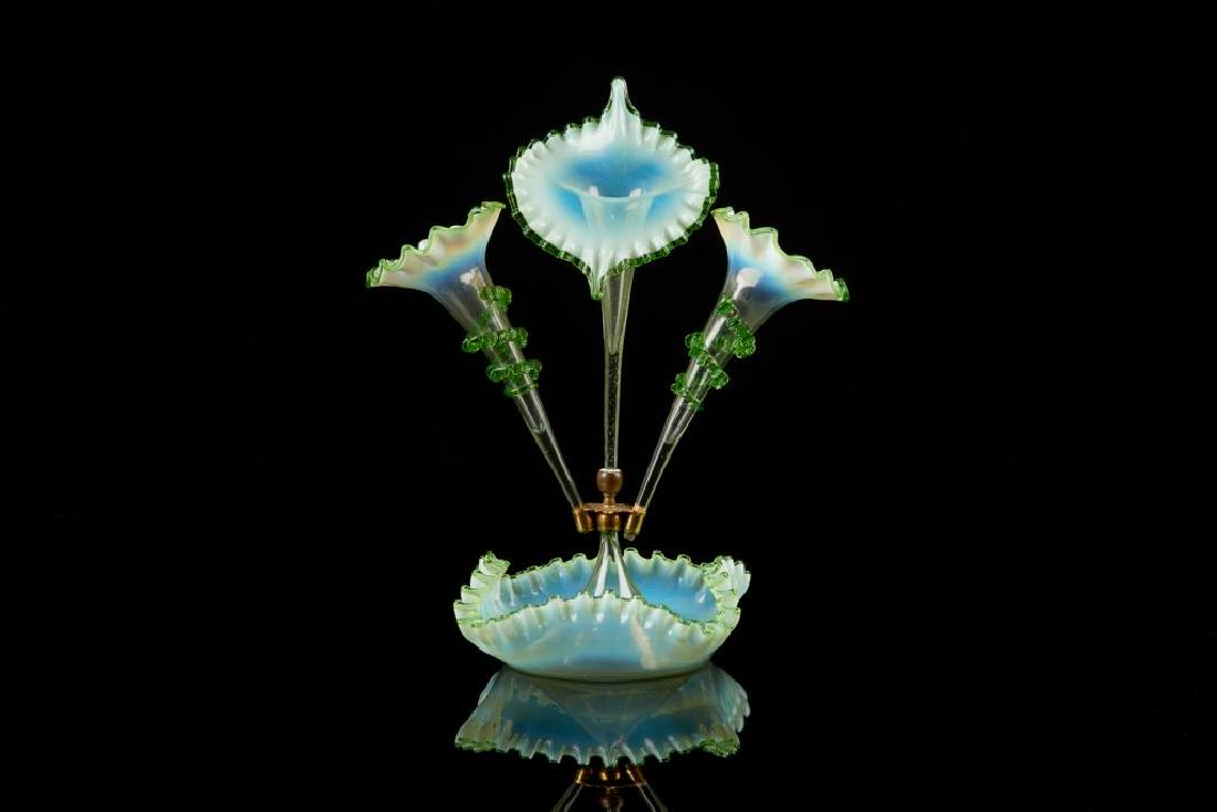 Victorian green glass epergne: With two trumpet form vases and a central Jack-in-the-pulpit form vase. H. 44.5 (17 1/2 in.)