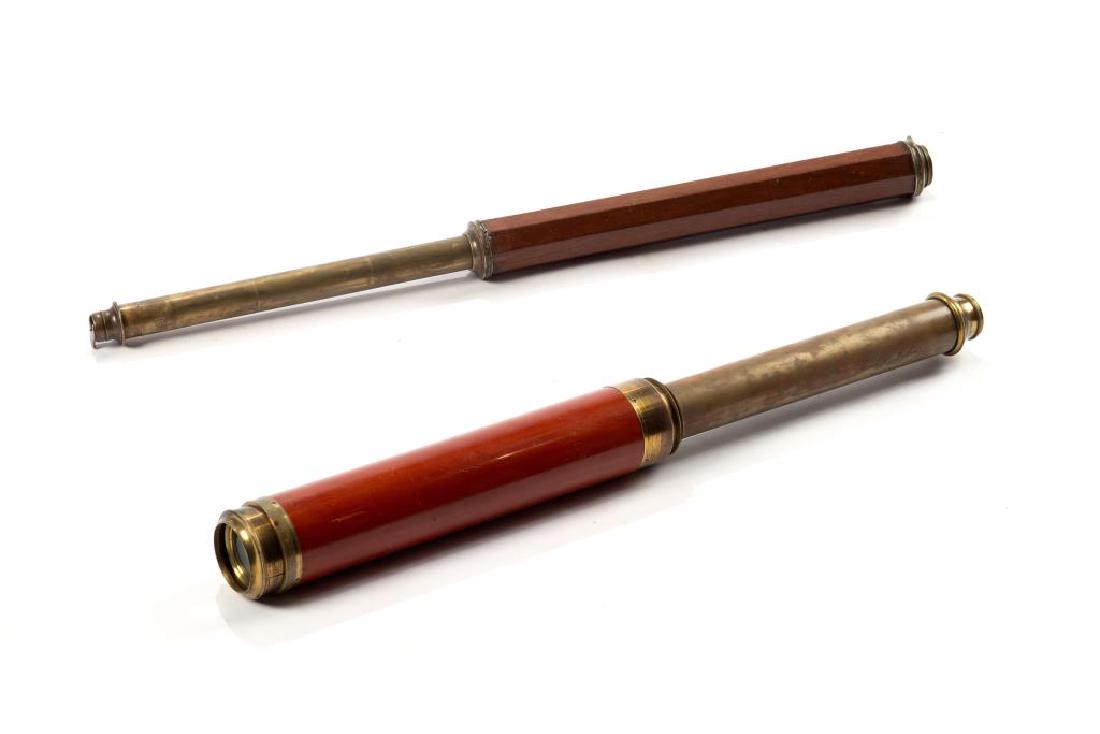 Two Antique telescopes: Strachan of London day or night telescope and a mahogany barreled eight sided telescope L of Strachan. when closed: 34.3 cm (13 1/2 in.) L. when fully extended: 57.8 cm (22 3/4 in.) Dia.of eyepiece: 4