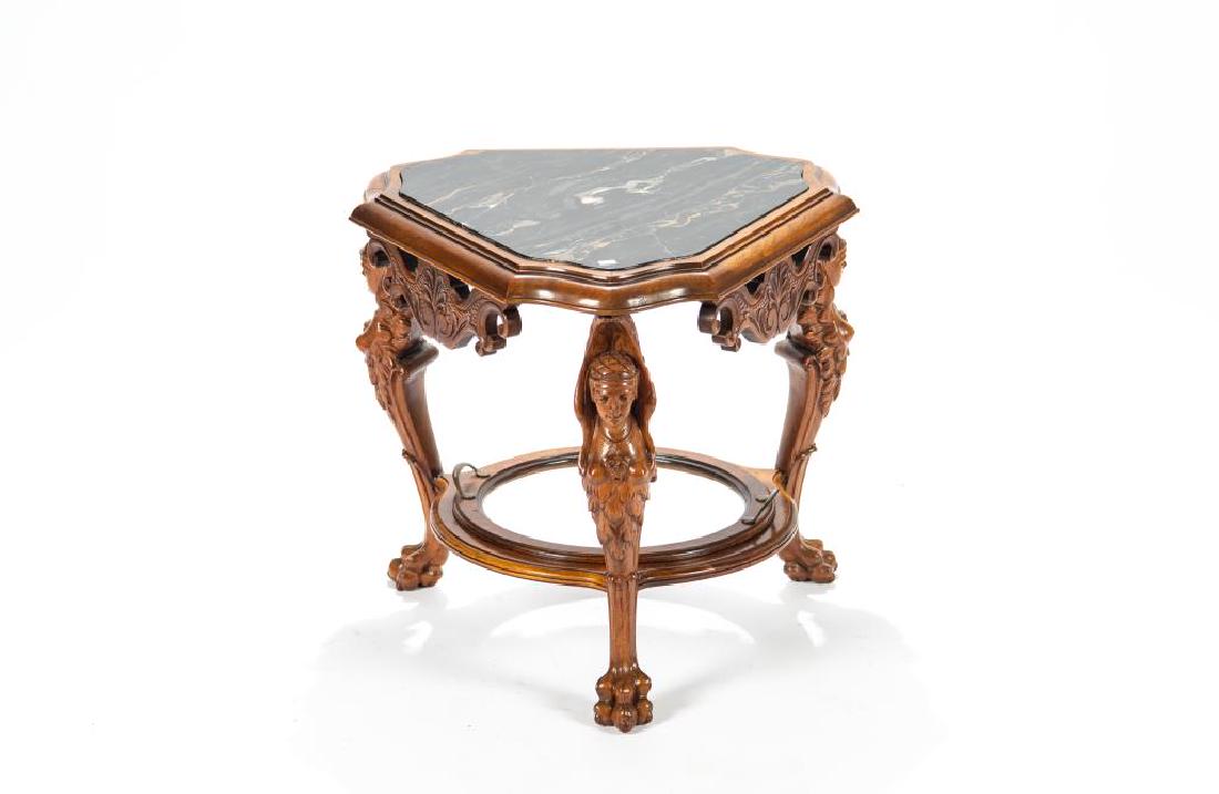 Walnut marble top side table: On carved figural supports, talon feet with removable drinks tray. 21 1/2 x 22 x 23 in.