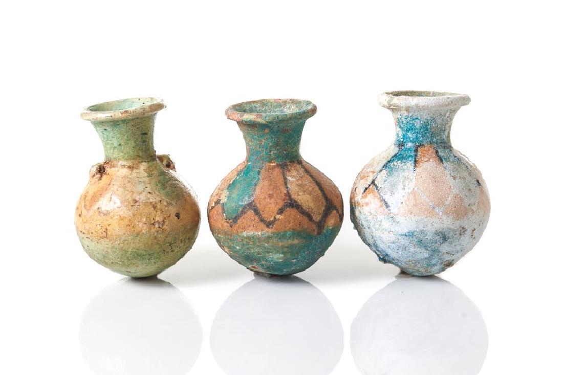 Three ancient pottery vessels (1 of 8)