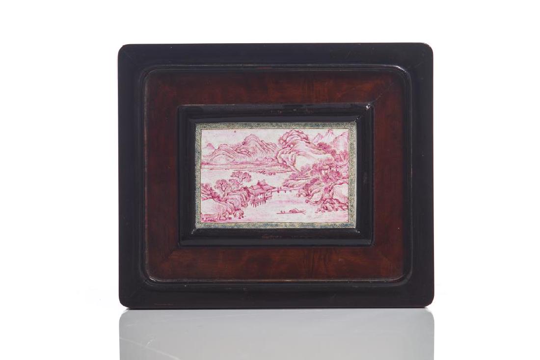 FRAMED CHINESE CANTON ENAMEL PLAQUE: Painted in ruby red enamel with a mountain and river landscape scene with figures and boat. 19th C. Visible plaque size: 9 x 13.5cm (3 1/2 x 5 1/4 in.) Provenance: Sotheby Parke Bernet & Co., 1978, wi