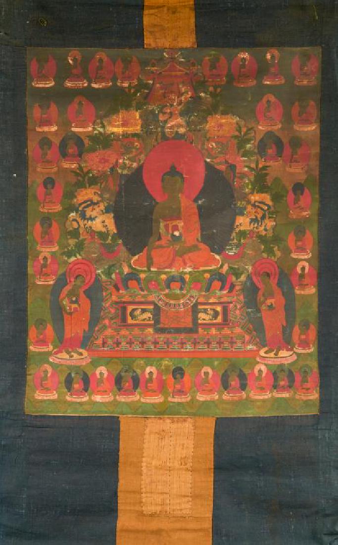 17TH C. TIBETAN THANGKA OF A MEDICINE BUDDHA: Painted with a seated Buddha to censer against a predominantly green background, surrounded by smaller Buddhas and auspicious animals. Pigment on canvas mounted with textile border. Visiblepainting si