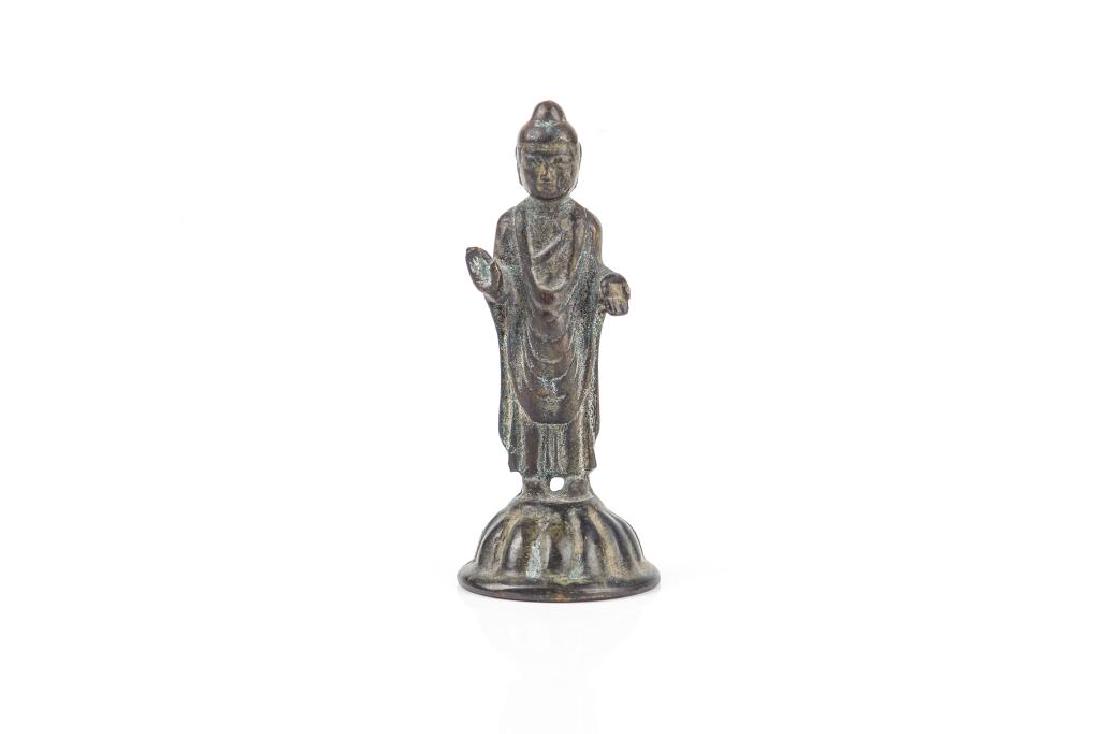 KOREAN SILLA PERIOD BRONZE STANDING BUDDHA: Standing on a lotus base with hands in abhayamudra and varadamudra, fine folds to robe. H. 11cm (4 3/8 in.) Weight: 205g.