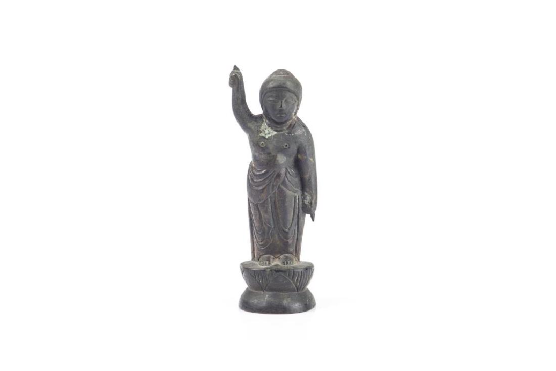 19TH C. JOSEON KOREAN BIRTHDAY BUDDHA: The standing birthday Buddha with right hand raised pointing up and left hand pointing down. Standing on a lotus base. H. 13cm (5 1/8 in.) Weight: 238g.